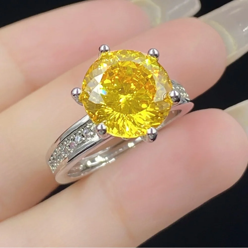 Sterling Silver Ring with Yellow Round Center Stone